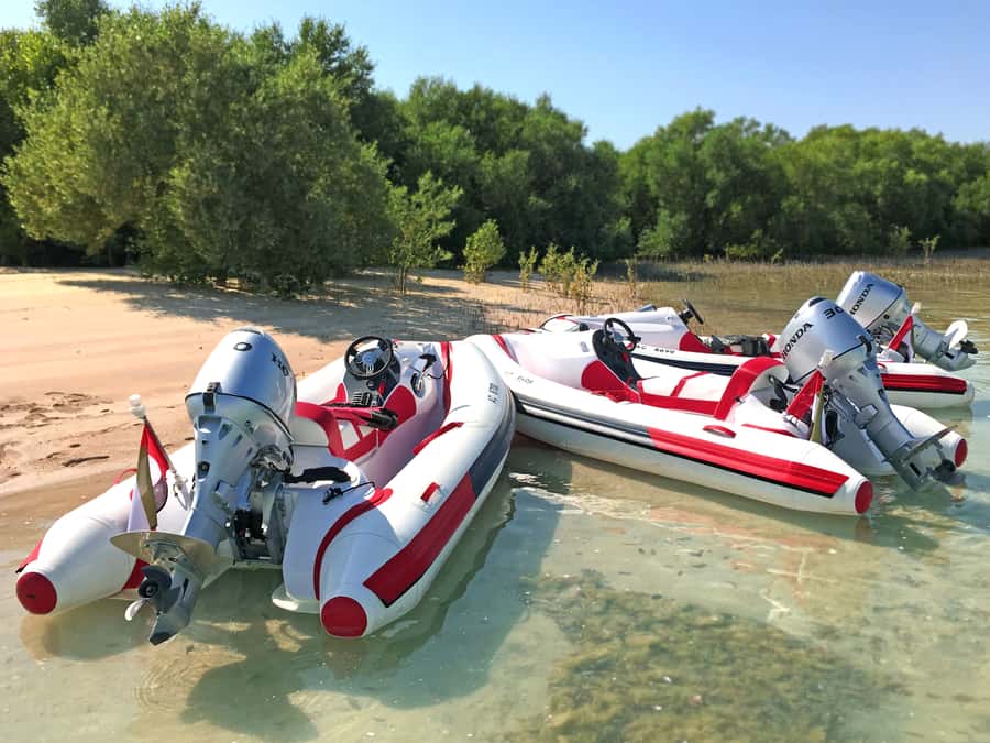 Abu Dhabi: Yas Island Self-Driving Guided Speedboat Tour - Peninsula Gold Beach and the swim stop