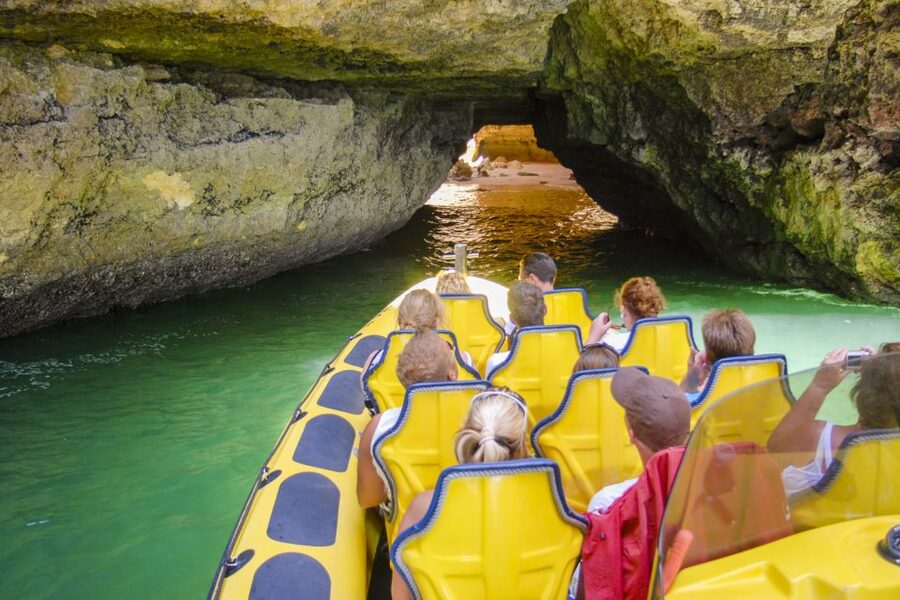 Albufeira: Benagil Caves & Dolphin Watching Speed Boat Tour - Entering Benagil Cave for a brief look