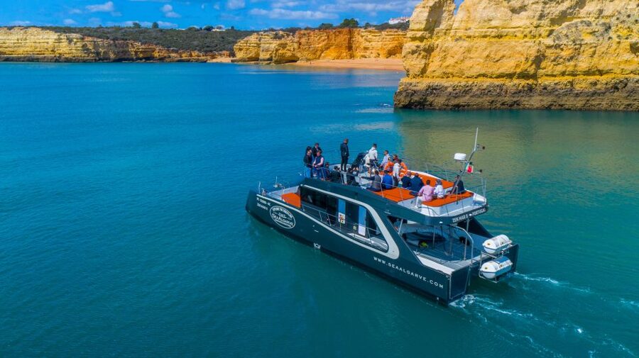 Albufeira: Coastline and Benagil Caves Tour by Catamaran - The Atlantic swim stop on the return