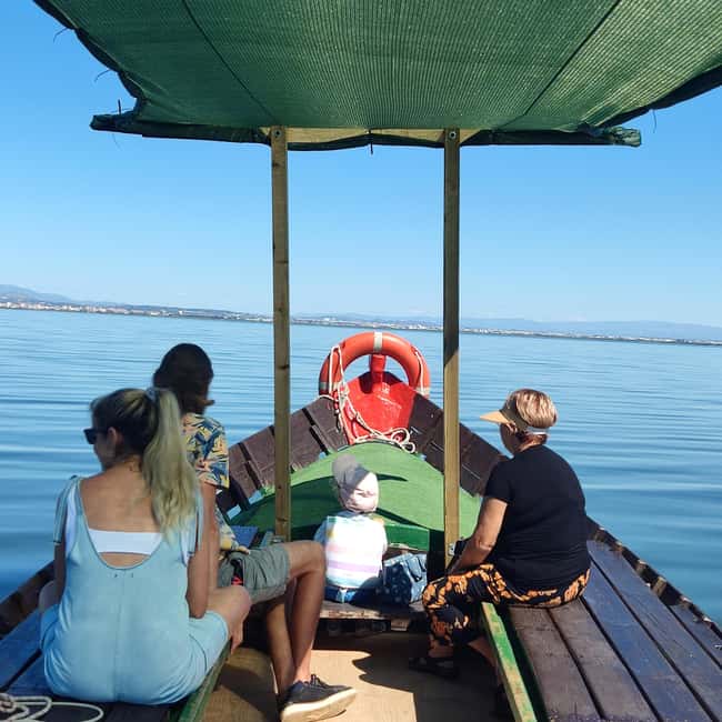 Albufera de Valencia: boat ride and visit to a barraca - Boarding a shaded boat for the 45-minute cruise