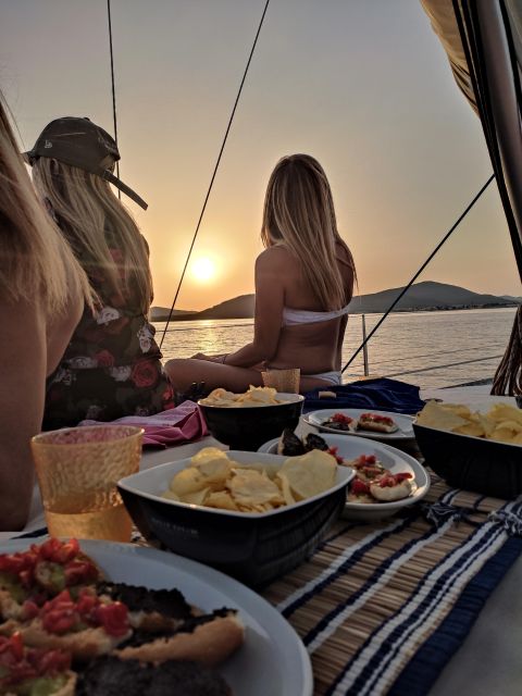 Alghero: Sunset Sailing Aperitif Experience - Sailing out from Pier 5 in Alghero