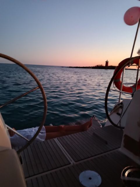 Alghero: Sunset Sailing Aperitif Experience - Music, photos, and the social side of the boat
