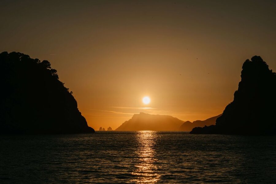 Amalfi Coast: Sunset Boat Tour with Fruit & Drinks - Drinks, music, and the social side