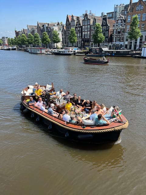 Amsterdam: Boat Tour with Optional Unlimited Drinks - Sea Palace, Amrâth, and Montelbaanstoren