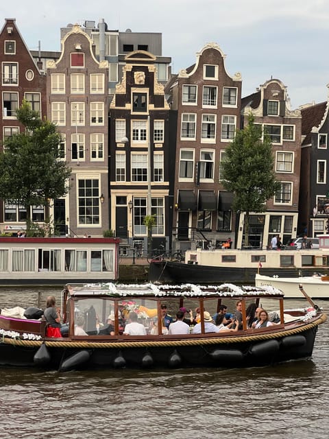 Amsterdam: Boat Tour with Optional Unlimited Drinks - Rembrandt House, Sint Antoniesluis, and the Amstel