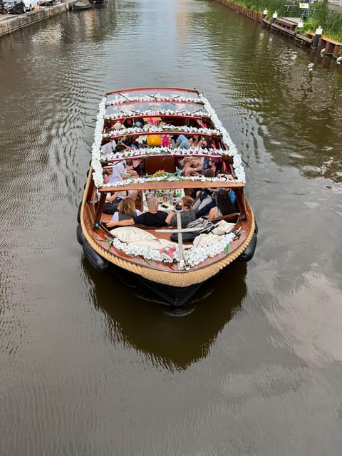 Amsterdam: Boat Tour with Optional Unlimited Drinks - Zuiderkerk, De LEurope, and the city lights