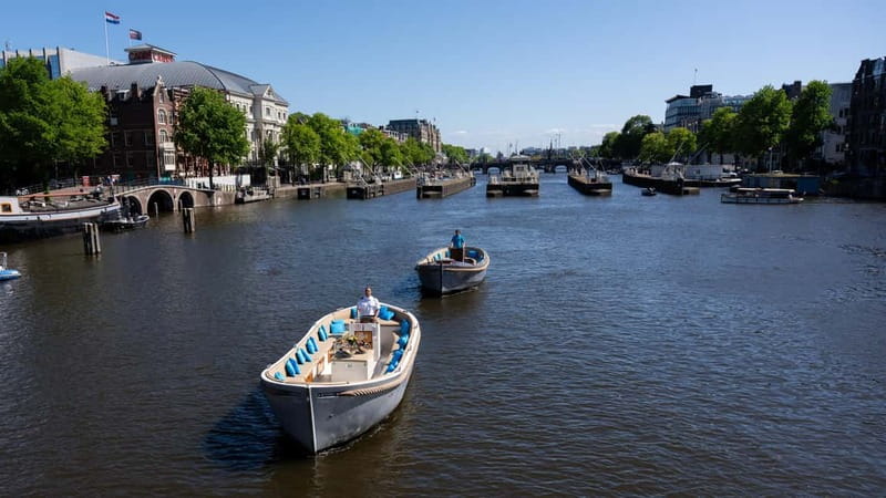 Amsterdam: Canal Cruise in Open Boat with Drink Option - Westerkerk, Prinsengracht, and the Nine Streets