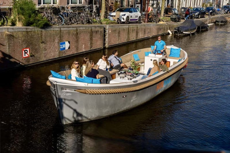 Amsterdam: Canal Cruise in Open Boat with Drink Option - Carré, the Magere Brug, and the eastern canals