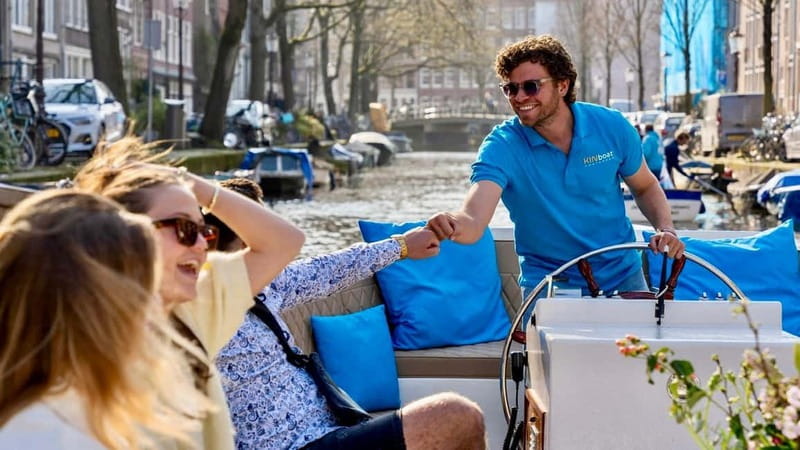 Amsterdam: Canal Cruise in Open Boat with Drink Option - Open boat comfort, drinks, and weather tips