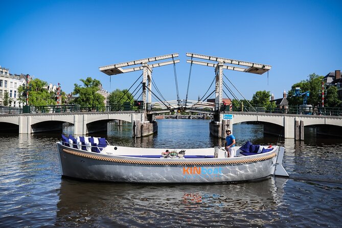 Amsterdam Canal Cruise in Open Boat with Unlimited Drinks Option - Westerkerk, bridges, and the city’s changing views
