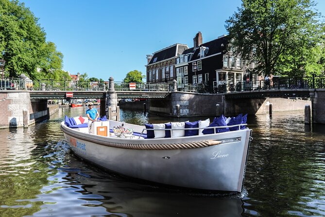 Amsterdam Canal Cruise in Open Boat with Unlimited Drinks Option - Cruising past the Hermitage Museum