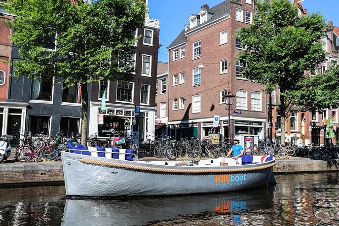 Amsterdam Canal Cruise in Open Boat with Unlimited Drinks Option - Sunset lights and evening atmosphere
