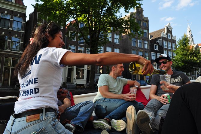 Amsterdam Canal Cruise With Live Guide and Unlimited Drinks - Starting near the Hermitage and the Amstel