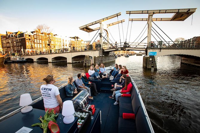 Amsterdam Canal Cruise With Live Guide and Unlimited Drinks - From Spiegelkwartier to Rokin