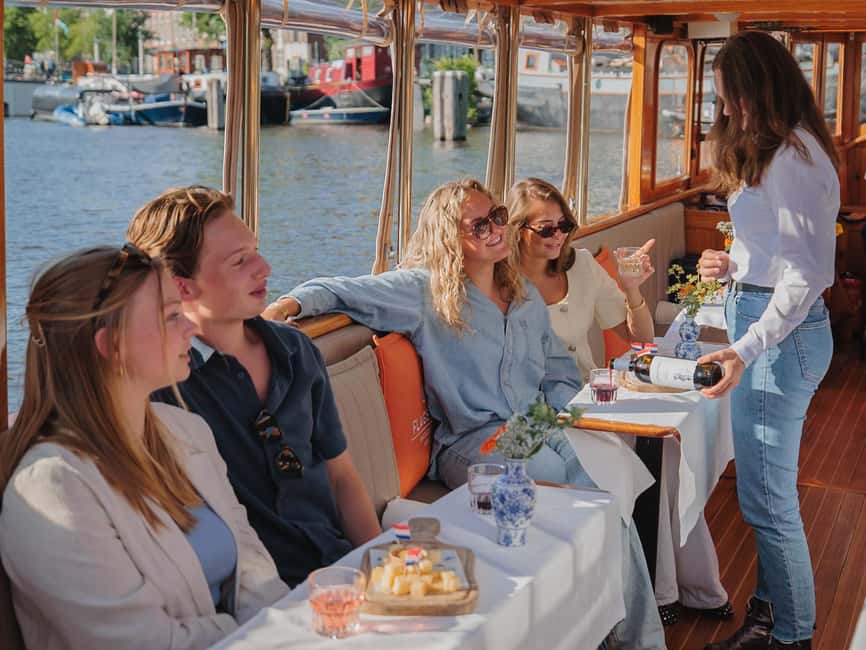 Amsterdam: Classic Saloon Boat Cruise with Cheese & Wine - Westerkerk, Prinsengracht, and the Jordaan