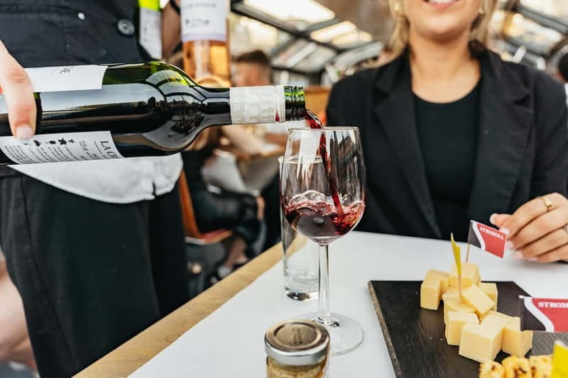Amsterdam: Cozy Cheese & Wine Cruise Tasting Experience - Inside the heated boat