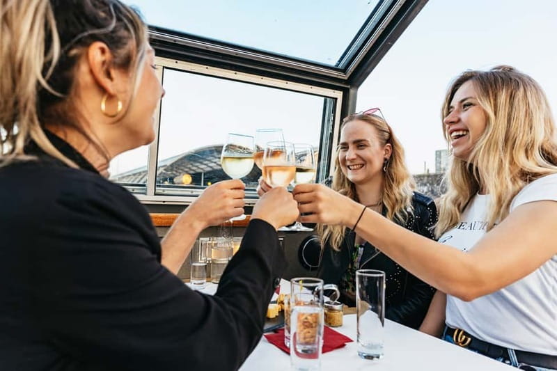Amsterdam: Cozy Cheese & Wine Cruise Tasting Experience - Following Amsterdam’s canal route