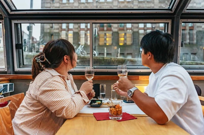 Amsterdam: Cozy Cheese & Wine Cruise Tasting Experience - The hosts make the difference