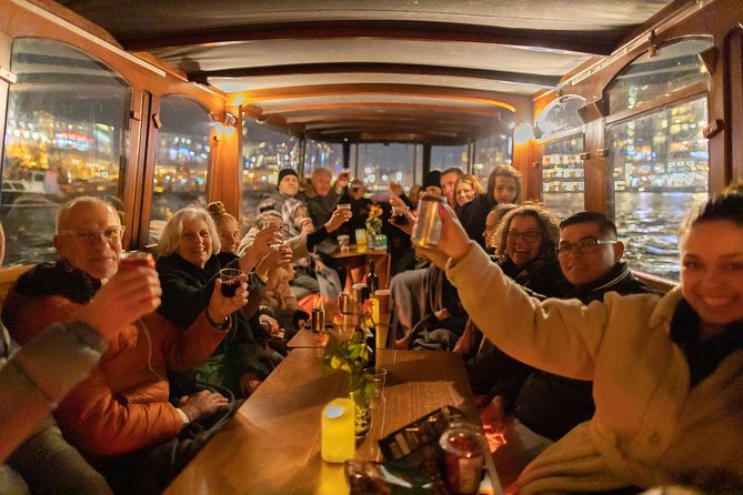 Amsterdam Evening Canal Cruise with Live Guide and Onboard Bar - Weather, boat changes, and comfort