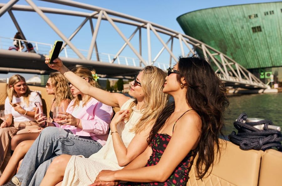 Amsterdam: Evening Candle Light Cruise With Wine & Cheese - A small boat with a social feel