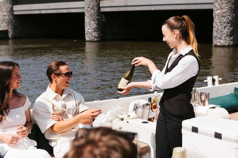 Amsterdam Evening (Sunset) Canal Cruise w/ optional drinks - The boat, seating, and group size