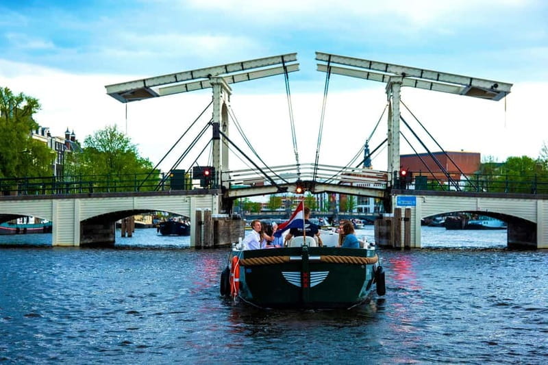 Amsterdam Evening (Sunset) Canal Cruise w/ optional drinks - Canal Belt, bridge lights, and the first stretch