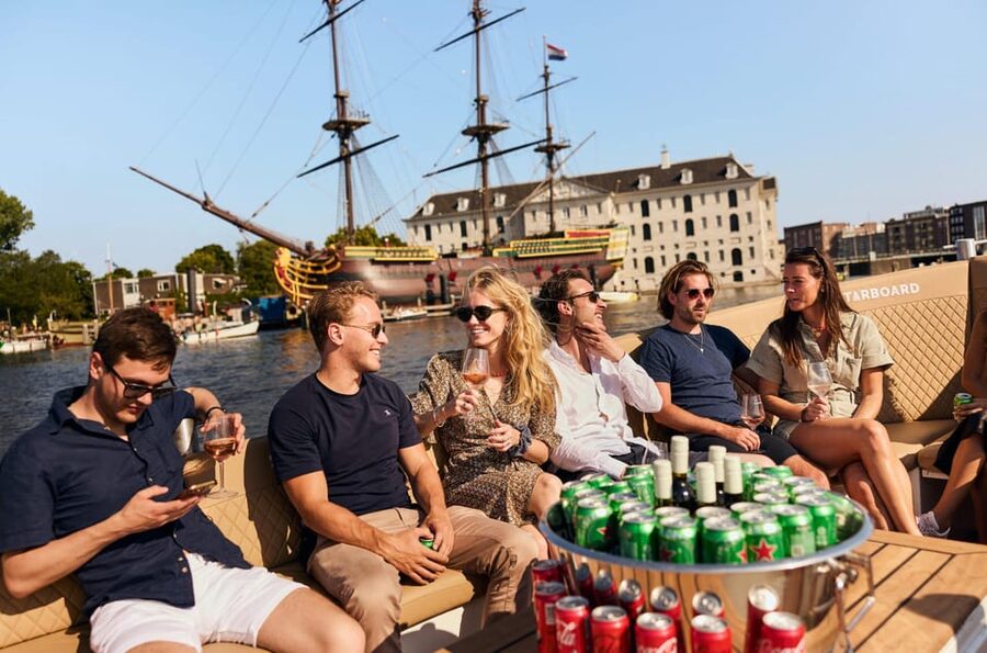 Amsterdam: German Guided Canal Cruise with on Board Bar - Basilica of Saint Nicholas and the city’s changing faiths