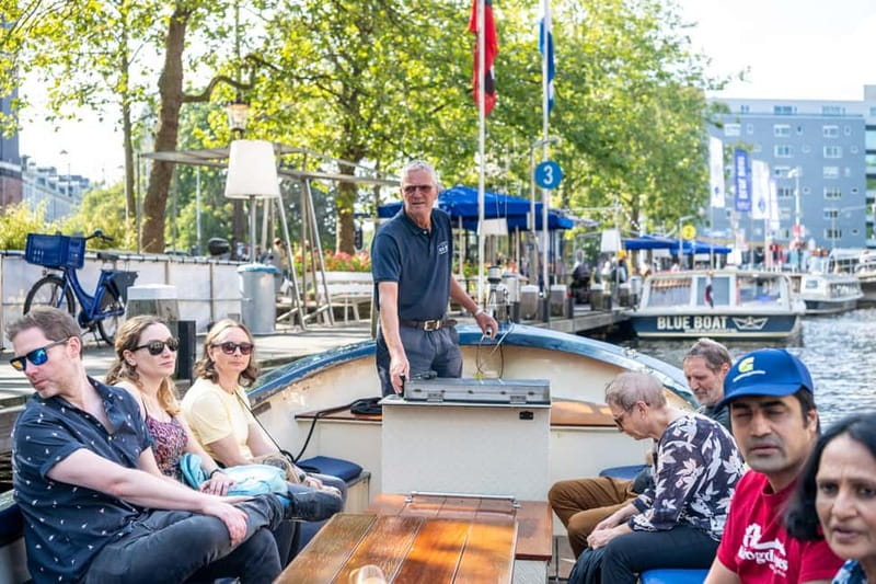 Amsterdam: Guided City Highlights Open Boat Canal Cruise - Why this open boat gives you a better view