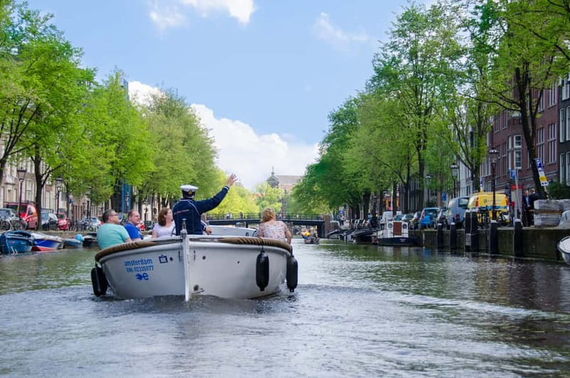 Amsterdam: Guided City Highlights Open Boat Canal Cruise - From Leidseplein to Amsterdam-Centrum