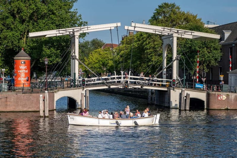Amsterdam: Guided City Highlights Open Boat Canal Cruise - NEMO, the Amstel, and Magere Brug