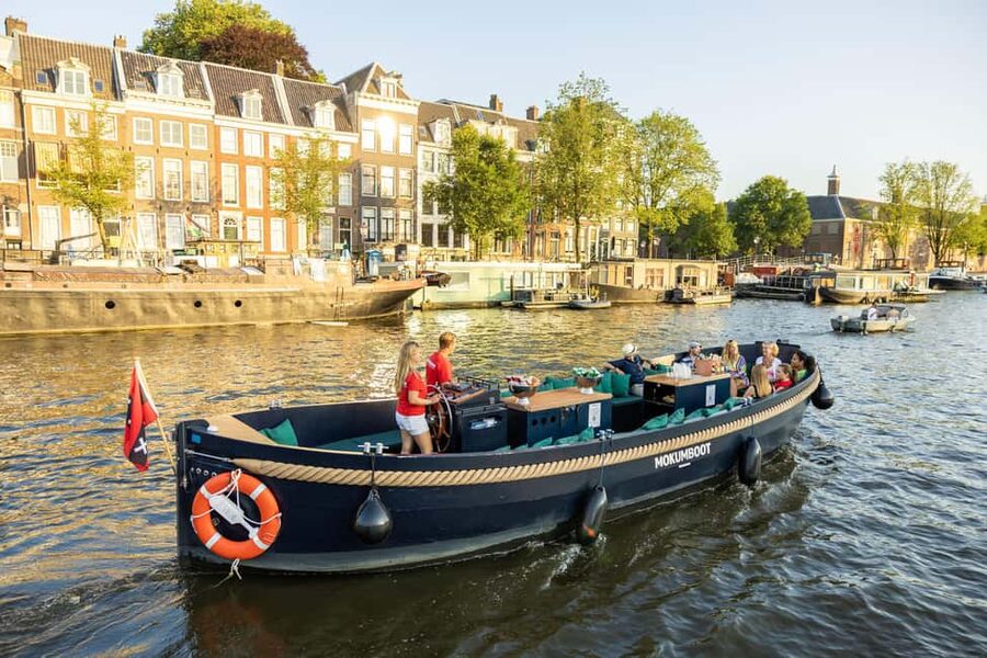 Amsterdam: Guided Open Boat Cruise Unlimited Drinks Option - Meeting the boat beside Amsterdam Centraal