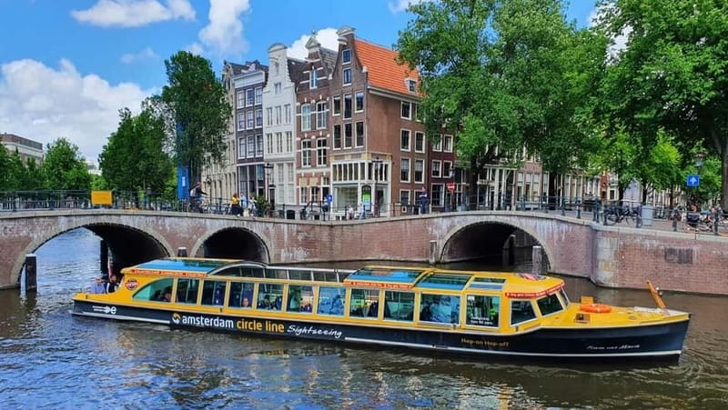 Amsterdam: Historic City Centre Canal Cruise - The boat, seating, and weather