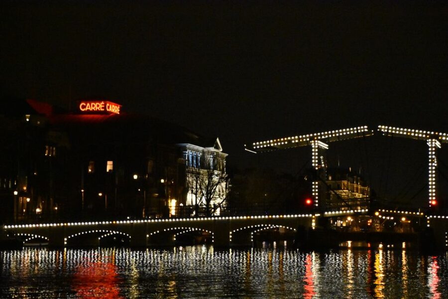 Amsterdam: Light Festival Cruise + Stroopwafel & Hot Choco - Herengracht, Haarlemmersluis, and the final approach
