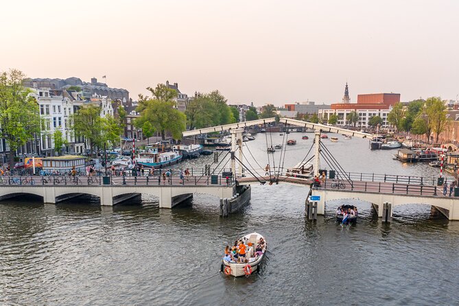 Amsterdam Luxury Canal Cruise + Unlimited Drinks & Bites option - A quiet hour on Amsterdam’s canals