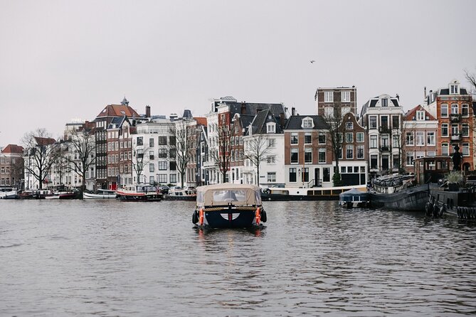 Amsterdam Newest Canal Cruise with local guide and small group - Sea Palace and the city’s many layers