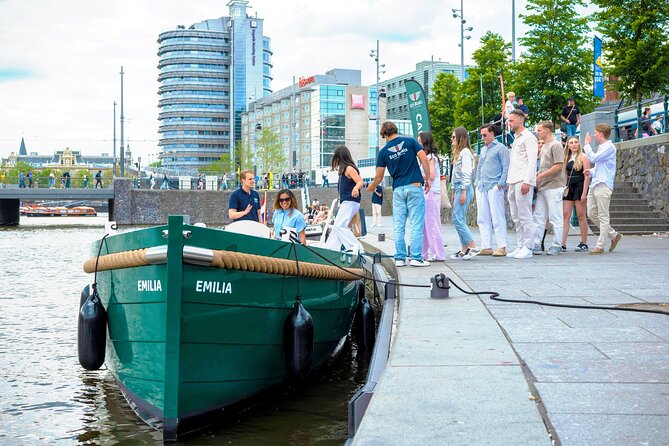 Amsterdam Newest Canal Cruise with local guide and small group - H’ART Museum, Oude Kerk, and De Wallen