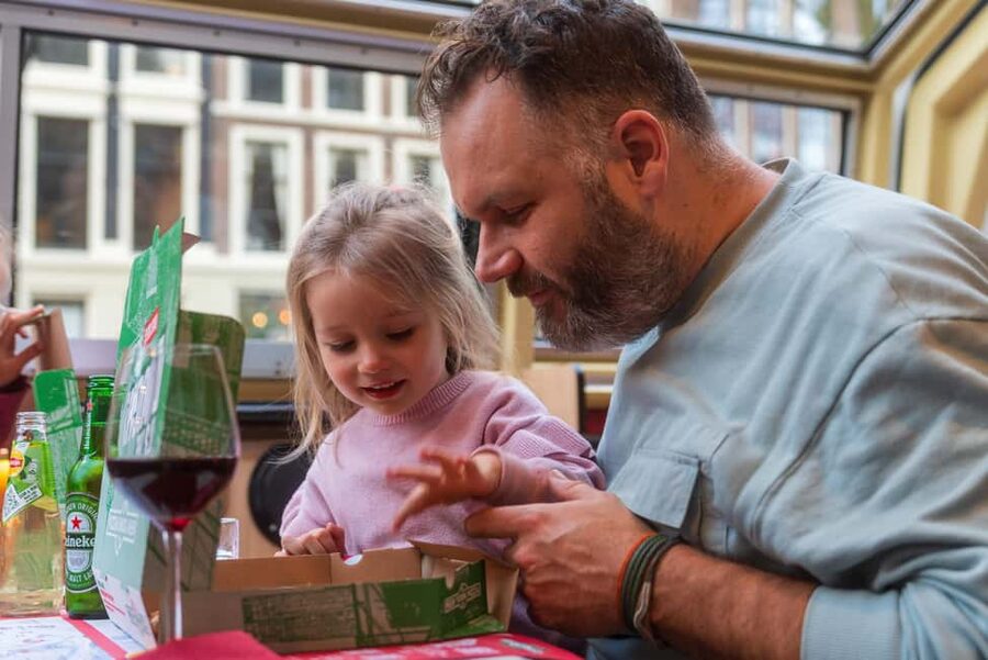 Amsterdam: Original Pizza Dinner Cruise + Unlimited Drinks - Damrak 16 and the First Canal Views