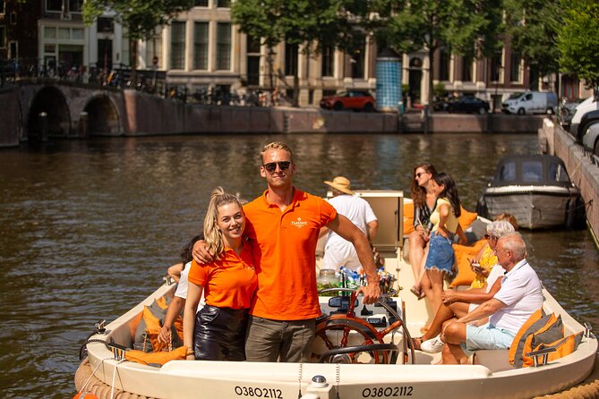 Amsterdam: Saloon Boat Cruise + Unlimited Drinks & Bite option - Weather, seating, and the step into the boat