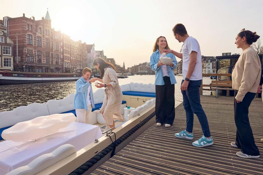 Amsterdam: Smoke & Cruise on covered Cannabis Boat With Bar - Ten Minutes Through the Red Light District