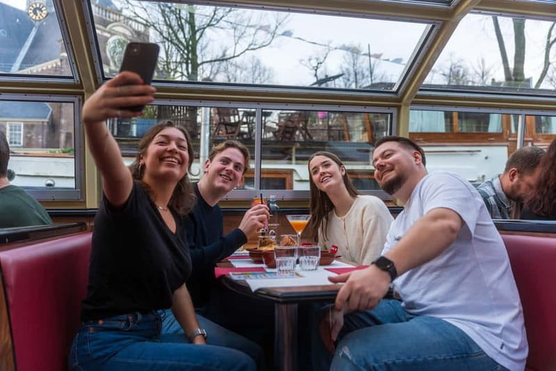 Amsterdam: Unlimited Cocktails Cruise on the Canals - Finding the boat at Damrak