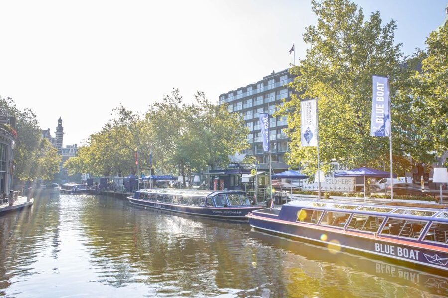 Amsterdam: Van Gogh Museum Ticket and City Canal Cruise - Walking to the canal cruise dock