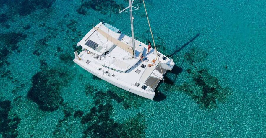 Athens: Catamaran Cruise with Fresh Lunch and Wine - Sailing back with fruit, wine, and possible sunset