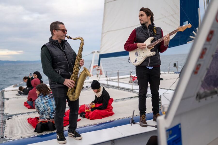 Barcelona: Catamaran Cruise with optional Live Jazz Music - Meeting the boat beside Columbus