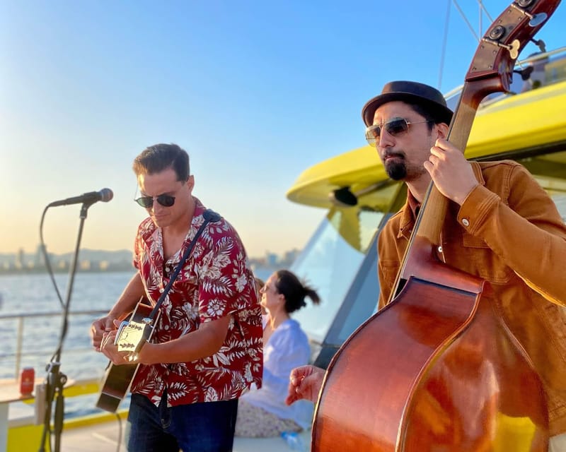 Barcelona: Daytime or Sunset Catamaran Cruise with Music - Daytime sailing: a cool break from Barcelona’s heat
