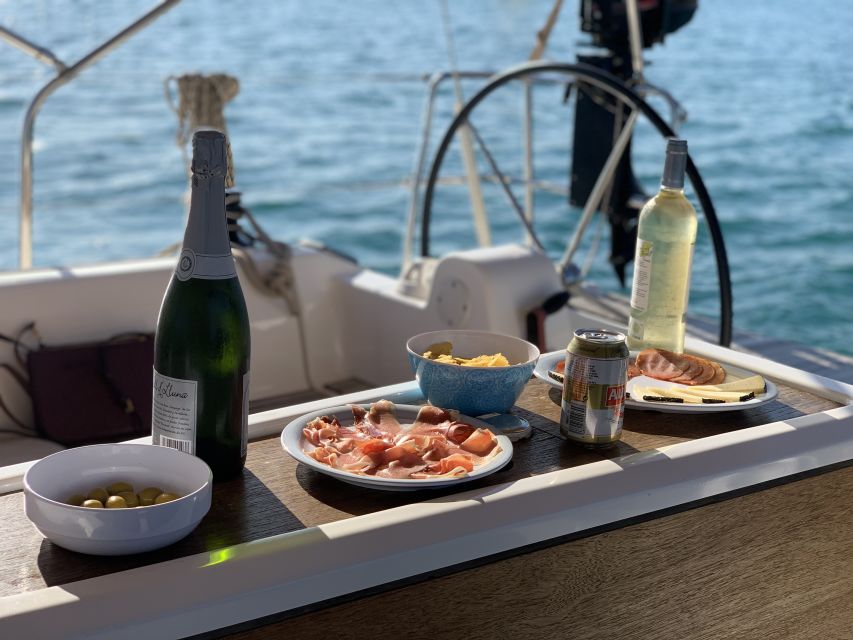 Barcelona: Midday or Sunset Sailing with Open Bar and Snacks - Open bar, snacks, and the social side
