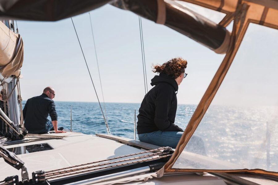 Barcelona: Midday or Sunset Sailing with Open Bar and Snacks - Boarding a yacht with room to settle in