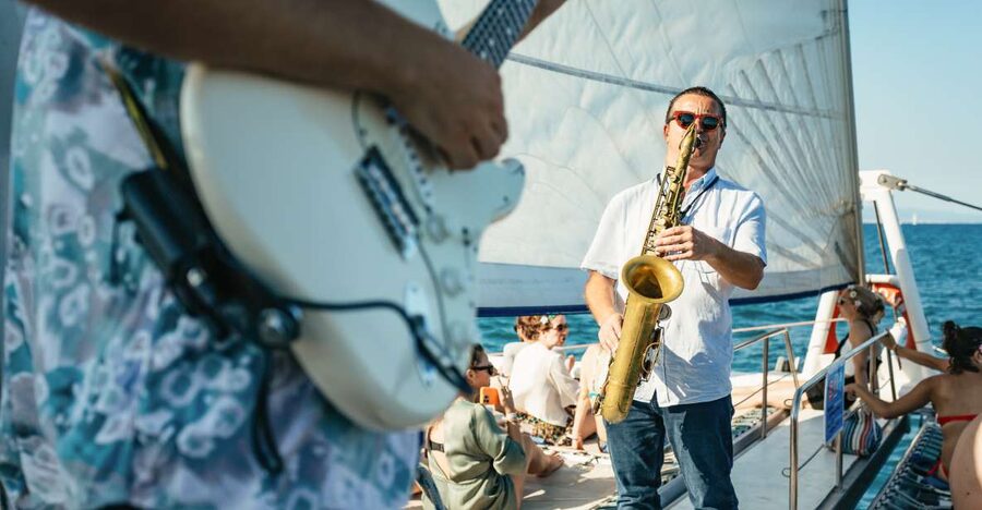 Barcelona: Sunset Catamaran Cruise with Live Music - Watching the sun fall over Barcelona