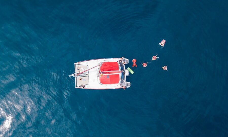 Barcelona: Sunset or Day Catamaran Cruise with Tapa & Drink - The daytime sailing and its 30-minute swim stop