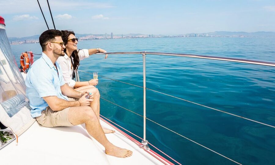 Barcelona: Sunset or Day Catamaran Cruise with Tapa & Drink - The sunset sailing and Barcelona from offshore