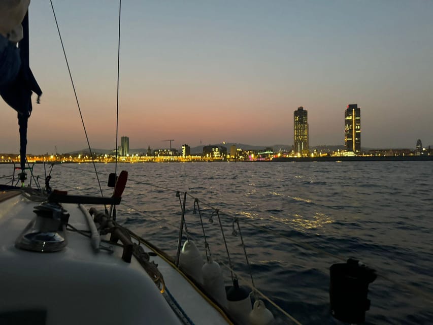 Barcelona: Sunset Sailboat Cruise with Drinks and Snacks - The first views: coastline, Montjuïc, and the city skyline
